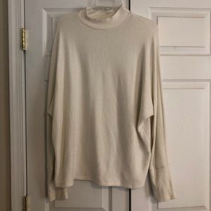 White mock neck sweater
